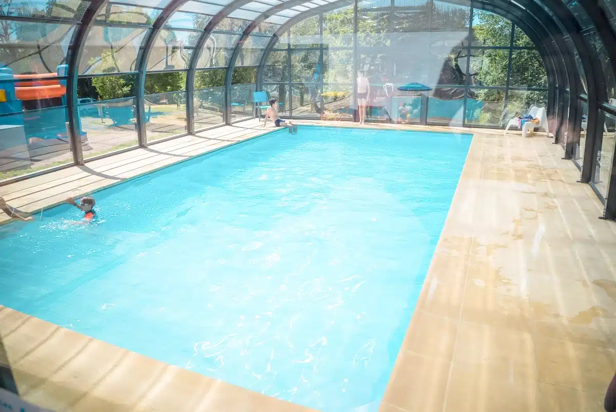 the heated swimming pool at camping paradis les chanterelles